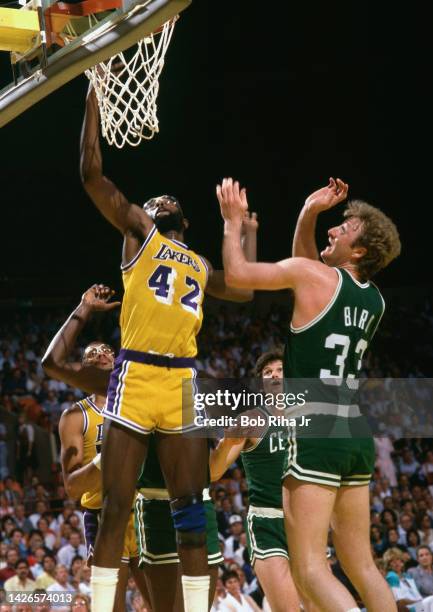 Lakers James Worthy and Celtics Larry Bird battle for rebound during 1985 NBA Finals between Los Angeles Lakers and Boston Celtics, June 4, 1985 in...