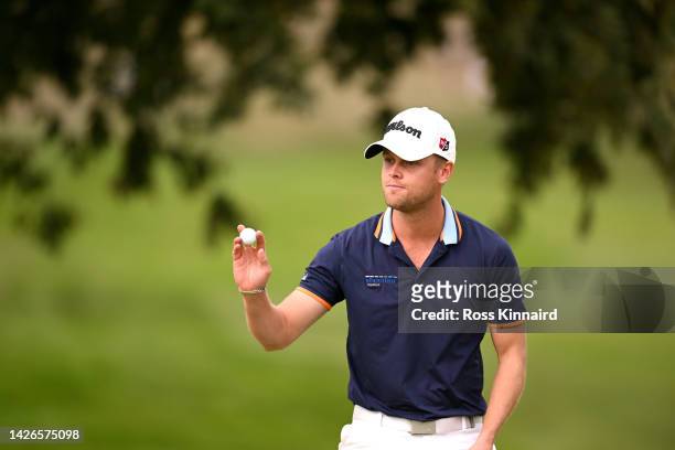 Hurly Long of Germany acknowledges the fans on the 3rd hole on Day Two of the Cazoo Open de France at Le Golf National on September 23, 2022 in...
