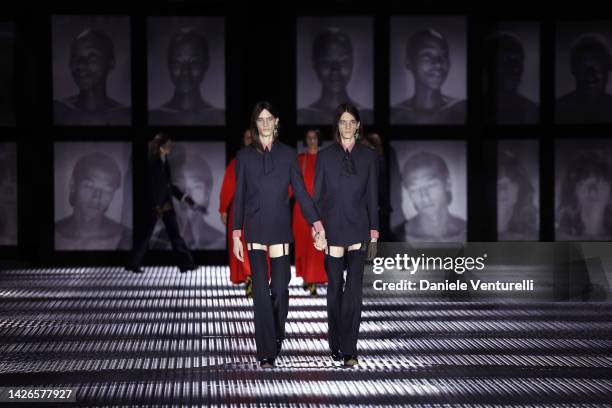 Models walk the runway of the Gucci Twinsburg Show during Milan Fashion Week Spring/Summer 2023 on September 23, 2022 in Milan, Italy.