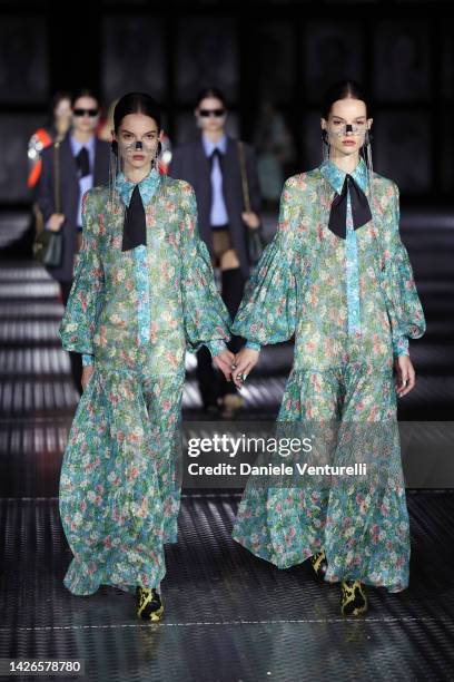 Models walk the runway of the Gucci Twinsburg Show during Milan Fashion Week Spring/Summer 2023 on September 23, 2022 in Milan, Italy.