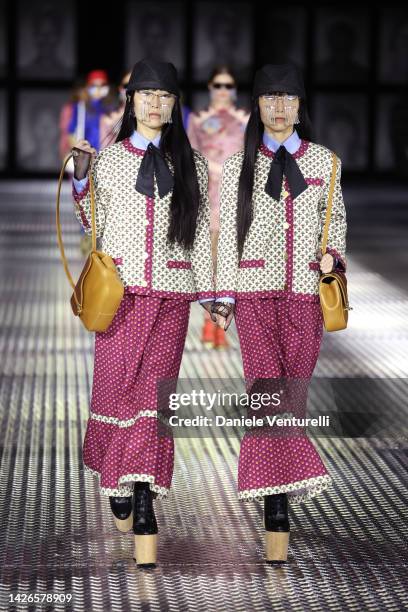 Models walk the runway of the Gucci Twinsburg Show during Milan Fashion Week Spring/Summer 2023 on September 23, 2022 in Milan, Italy.