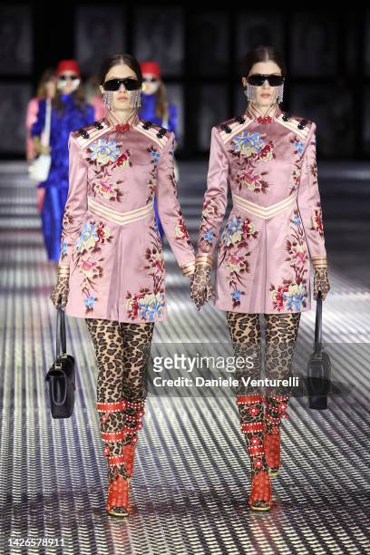 Models walk the runway of the Gucci Twinsburg Show during Milan Fashion Week Spring/Summer 2023 on September 23, 2022 in Milan, Italy.