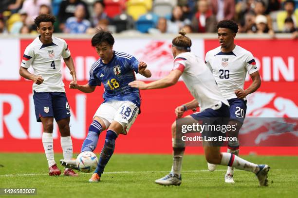 Kaoru Mitoma of Team Japan scores their team's second goal during the International Friendly match between Japan and United States at Merkur...