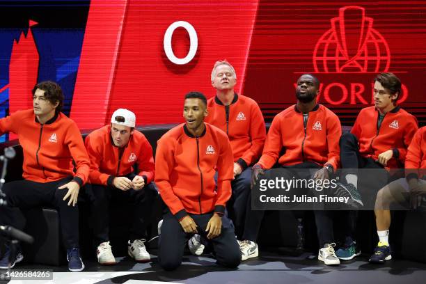 Players of Team World react following Jack Sock of Team World's defeat to Casper Ruud of Team Europe during Day One of the Laver Cup at The O2 Arena...