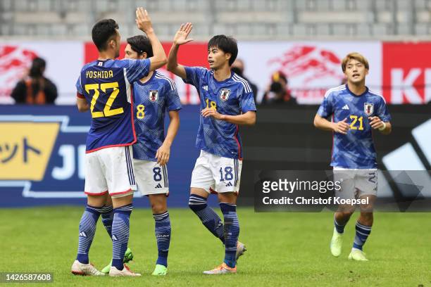 Kaoru Mitoma of Team Japan celebrates scoring their team's second goal with teammates during the International Friendly match between Japan and...