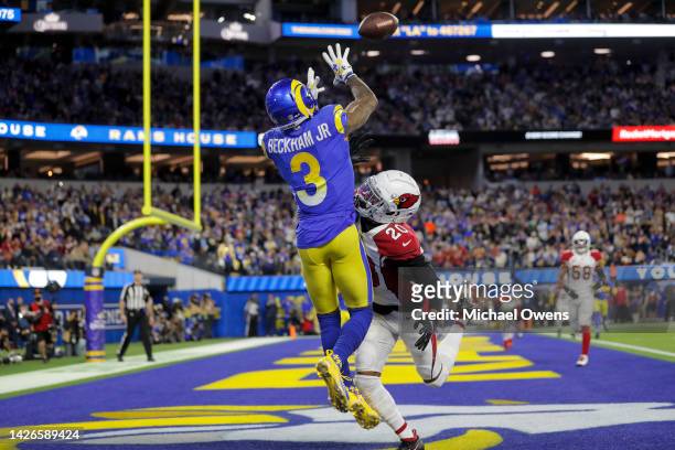 Odell Beckham Jr. #3 of the Los Angeles Rams completes a pass against Marco Wilson of the Arizona Cardinals for a touchdown during the NFC Wild Card...