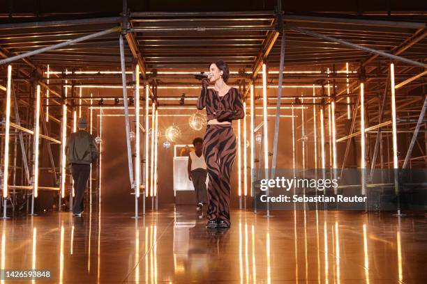 Lena Meyer-Landrut performs during the runway at the a lot less by Lena Meyer-Landrut show during the ABOUT YOU Fashion Week Milan 2022 at Zona...