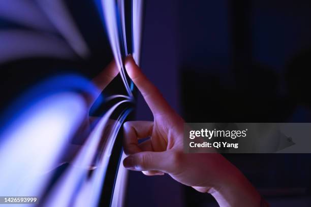 close-up of clicking on computer screen - finger touching stock pictures, royalty-free photos & images