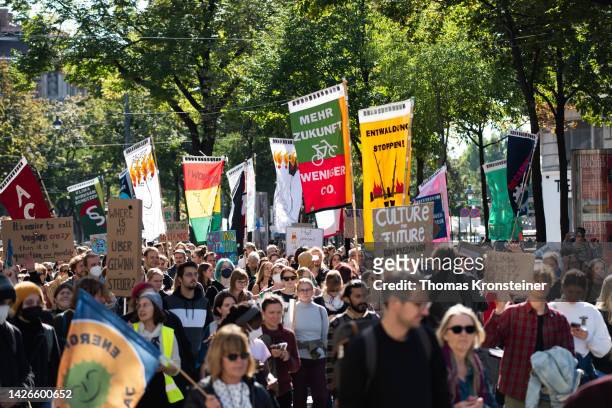 Supporters of the Fridays for Future climate action movement march during a global climate strike on September 23, 2022 in Vienna, Austria. Similar...