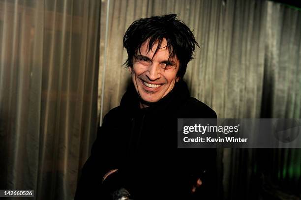 Musician Tommy Lee poses at the after party for the screening of "Waiting for Lightning" at the Roosevelt Hotel on April 10, 2012 in Los Angeles,...