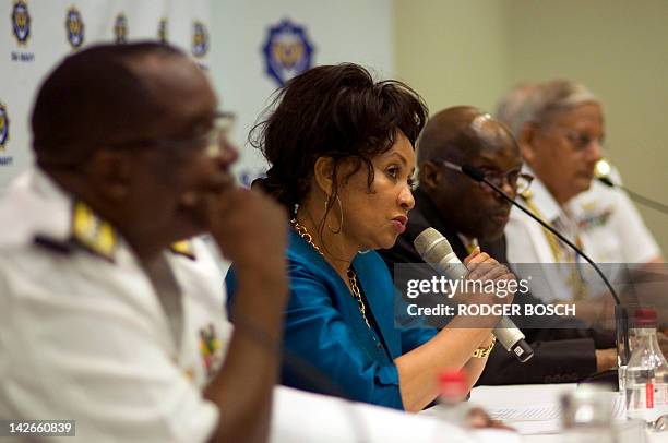 South African Defense Minister Lindiwe Sisulu gives a press conference on April 11, 2012 in Cape Town with South African Vice Admiral Johannes Mudimu...