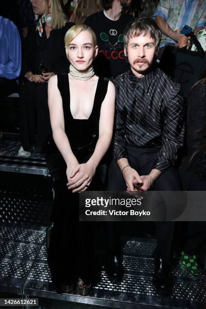 Julia Garner and Mark Foster is seen at the Gucci Show during Milan Fashion Week Spring/Summer 2023 on September 23, 2022 in Milan, Italy.