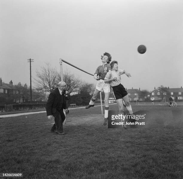 Team coach and manager P. Ashley refereeing a Nomad Ladies Football Club match during a training session in Didsbury, Manchester, April 1960....