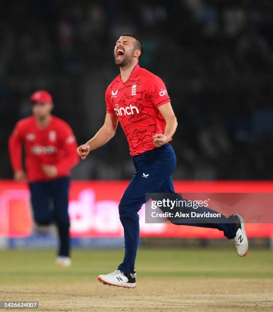 Mark Wood of England celebrates dismissing Haider Ali of Pakistan during the 3rd IT20 between Pakistan and England at Karachi National Stadium on...