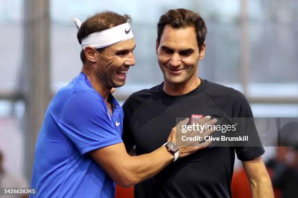Rafael Nadal and Roger Federer of Team Europe interact during a practice session during Day One of the Laver Cup at The O2 Arena on September 23,...