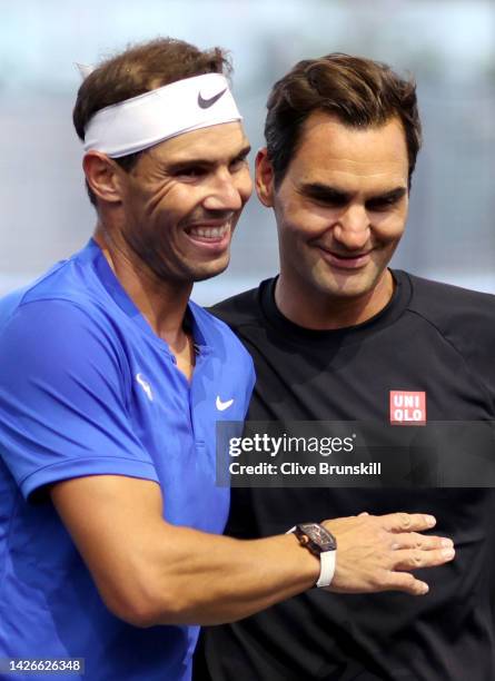 Rafael Nadal and Roger Federer of Team Europe interact during a practice session during Day One of the Laver Cup at The O2 Arena on September 23,...