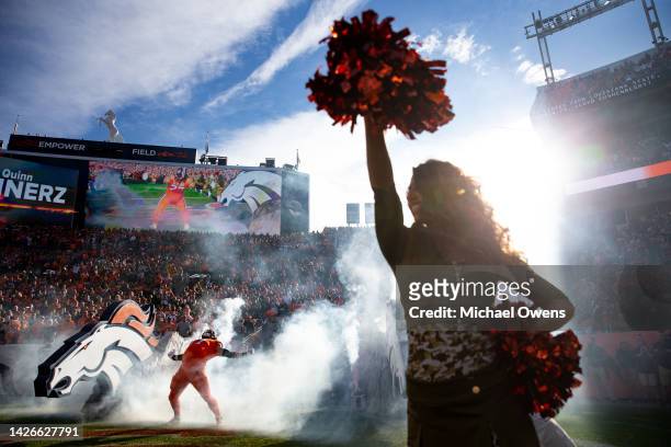 Quinn Meinerz of the Denver Broncos reacts as he takes the field prior to an NFL football game against the Philadelphia Eagles at Empower Field on...