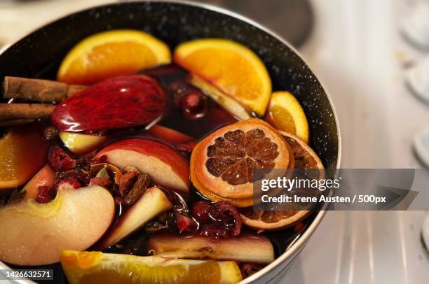 high angle view of food in bowl on table - mulled wine stock pictures, royalty-free photos & images