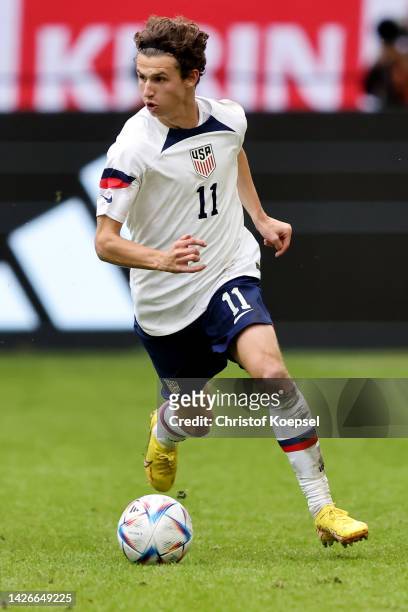Brenden Aaronson of United States runs with the ball during the international friendly match between Japan and United States at Merkur Spiel-Arena on...