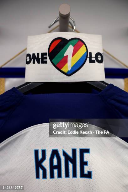 Detailed view of the ONE LOVE Captains Arm Band next to the shirt of Harry Kane of England on the inside of the England changing room prior to kick...