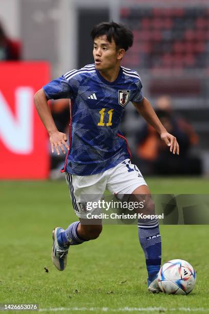 Takefusa Kubo of Japan runs with the ball during the international friendly match between Japan and United States at Merkur Spiel-Arena on September...