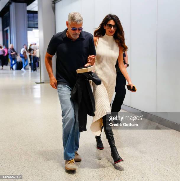 George Clooney and Amal Clooney head to an Amtrak station on September 23, 2022 in New York City.