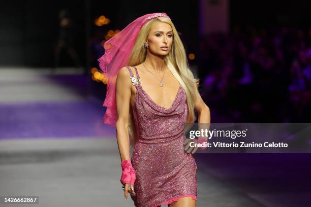 Paris Hilton walks the runway at the Versace Fashion Show during the Milan Fashion Week Womenswear Spring/Summer 2023 on September 23, 2022 in Milan,...