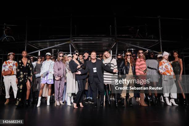 Fashion Designer Guido Maria Kretschmer poses with models after the runway at the Guido Maria Kretschmer show during the ABOUT YOU Fashion Week Milan...