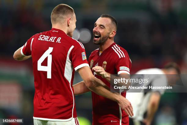 Attila Szalai of Hungary celebrates their side's win with Attila Fiola after the final whistle of the UEFA Nations League League A Group 3 match...