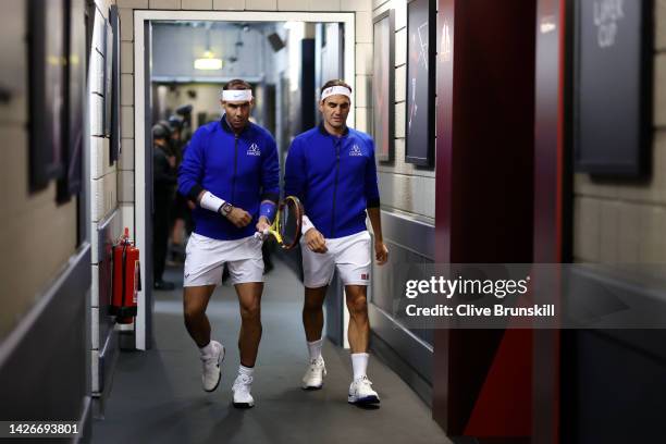 Rafael Nadal and Roger Federer of Team Europe make their way towards Centre Court ahead of their match during Day One of the Laver Cup at The O2...