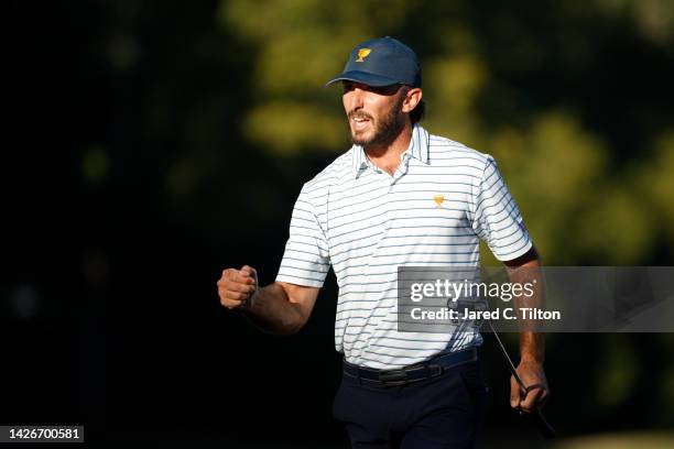 Max Homa of the United States Team celebrates winning the 17th hole during Friday four-ball matches on day two of the 2022 Presidents Cup at Quail...