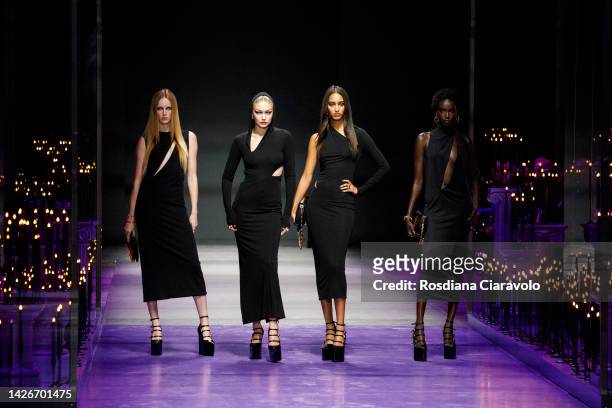 Models Rianne Van Rompaey, Gigi Hadid, Mona Tougaard and Anouk Yai walk the runway of the Versace Fashion Show during the Milan Fashion Week...