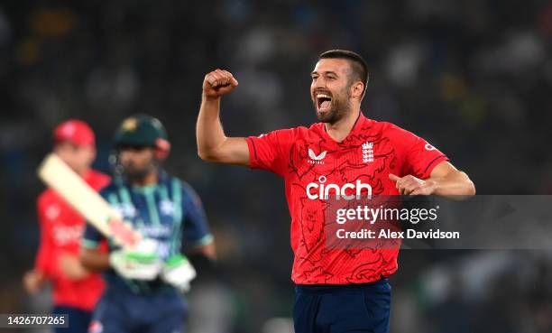 Mark Wood of England celebrates taking the wicket of Babar Azam of Pakistan during the 3rd IT20 match between Pakistan and England at Karachi...