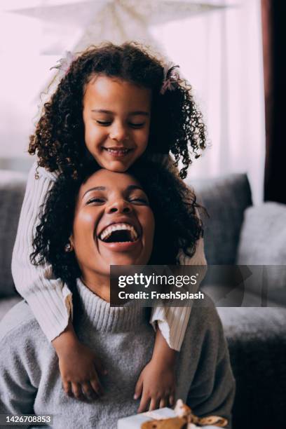 daughter hugging her mother - family laughing stock pictures, royalty-free photos & images