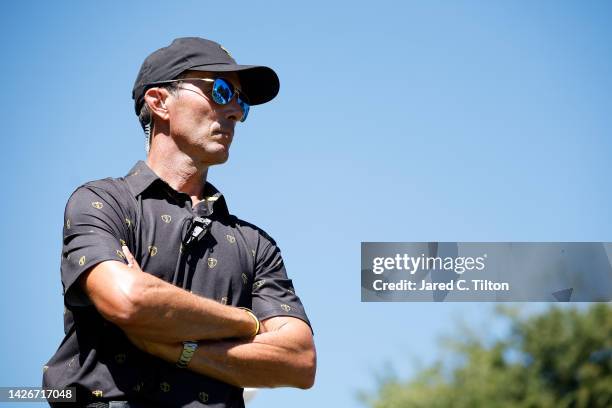 Assistant Captain Mike Weir of the International Team looks on from the fourth tee during Friday four-ball matches on day two of the 2022 Presidents...