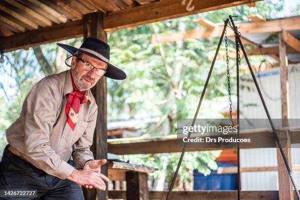 portrait of a gaucho at the farroupilha camp - orgulho stock pictures, royalty-free photos & images