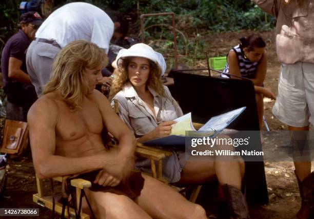 German-Canadian actor, screenwriter, and producer Wolf Larson and French-American model and actress Lydie Denier, pose on the set of the TV series...