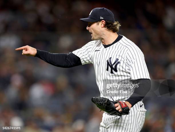 Gerrit Cole of the New York Yankees argues with the umpire in the sixth inning after a ball was called and the very next pitch Alex Verdugo of the...