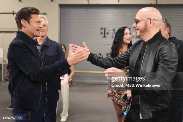 Ryan Seacrest and Pitbull attend the 2022 iHeartRadio Music Festival at T-Mobile Arena on September 23, 2022 in Las Vegas, Nevada.