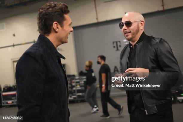 Ryan Seacrest and Pitbull attend the 2022 iHeartRadio Music Festival at T-Mobile Arena on September 23, 2022 in Las Vegas, Nevada.