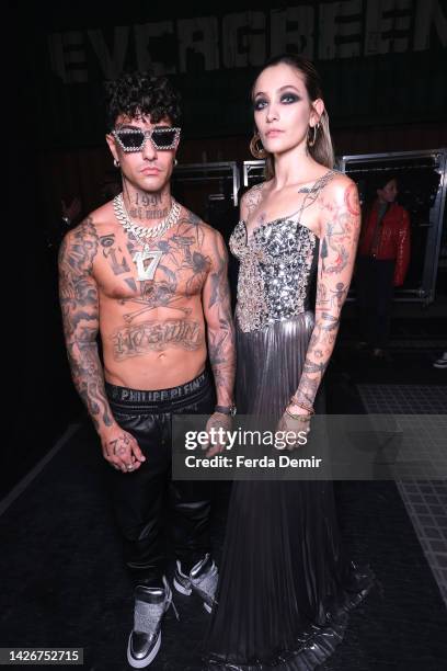 Tony Effe and Paris Jackson pose at the backstage of the Philipp Plein SS23 Fashion Show during the during the Milan Fashion Week Womenswear...