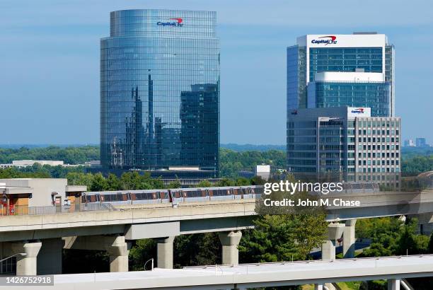 metro silver line train and capital one financial corporation headquarters, mclean, virginia (usa) - mclean stock pictures, royalty-free photos & images