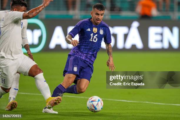 Forward Angel Correa of Argentina kicks the ball during the international friendly match between Honduras and Argentina at Hard Rock Stadium on...