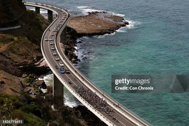 General view of the peloton passing through a sea landscape during the 95th UCI Road World Championships 2022 - Women Elite Road Race a 164,3km one...