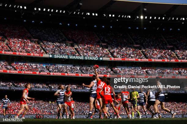 Tom Hawkins of the Cats and Tom Hickey of the Swans contest the ruck during the 2022 AFL Grand Final match between the Geelong Cats and the Sydney...