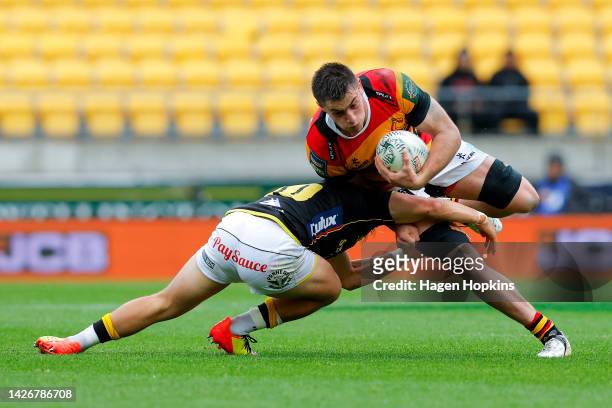 Hamilton Burr of Waikato is tackled during the round eight Bunnings NPC match between Wellington and Waikato at Sky Stadium, on September 24 in...