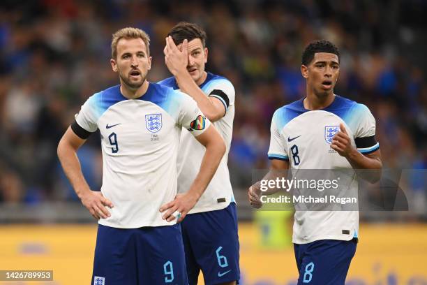 Harry Kane, Harry Maguire and Jude Bellingham of England look on during the UEFA Nations League League A Group 3 match between Italy and England at...