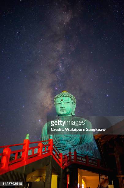 giant buddha and milky way in sky. - kamakura city stock pictures, royalty-free photos & images