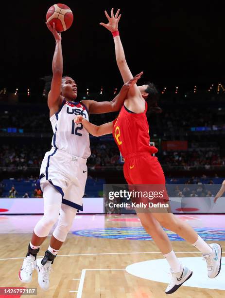 Alyssa Thomas of the United States drives to the basket against Zhenqi Pan of China during the 2022 FIBA Women's Basketball World Cup Group A match...