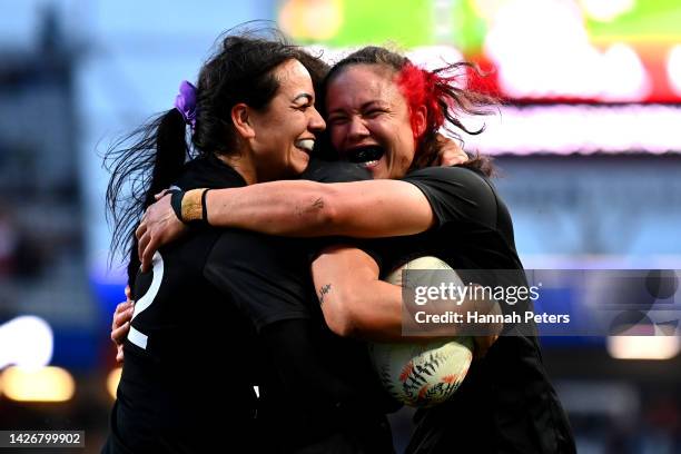 Portia Woodman of the Black Ferns celebrates after scoring a try with Stacey Fluhler and Ruby Tui of the Black Ferns during the International Women's...